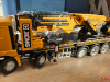 75144.1 Масштабная модель шарнирно-сочленённого автокрана XCMG SQZ4500 желтый масштабе 1:35