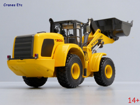 13782 Масштабная модель New Holland фронтальный погрузчик W300C  в масштабе 1:50