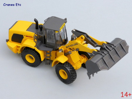 13782 Масштабная модель New Holland фронтальный погрузчик W300C  в масштабе 1:50