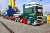 01-5551 Масштабная модель Низкорамный трал SCANIA R HIGHLINE CR20H 8X4 в масштабе 1 50