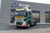 01-5375 Масштабная модель Низкорамный трал VOLVO FH5 GLOBETROTTER XL 8X4 в масштабе 1 50