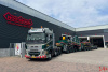 01-5375 Масштабная модель Низкорамный трал VOLVO FH5 GLOBETROTTER XL 8X4 в масштабе 1 50