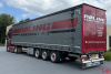 01-5484 Масштабная модель Тентованный прицеп VOLVO FH5 GLOBETROTTER XL 4X2 в масштабе 1 50