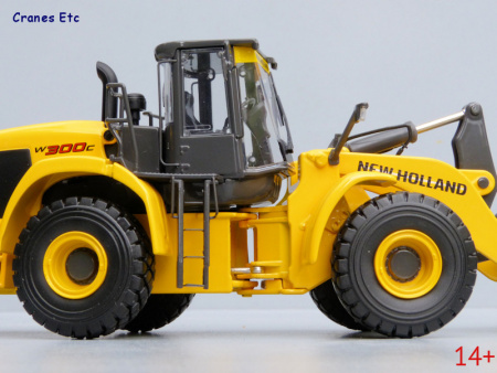 13782 Масштабная модель New Holland фронтальный погрузчик W300C  в масштабе 1:50