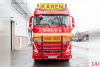 01-5006 Масштабная модель Аэродромный тягач VOLVO FH5 GLOBETROTTER FALKOM 8X4 в масштабе 1 50