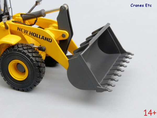 13782 Масштабная модель New Holland фронтальный погрузчик W300C  в масштабе 1:50