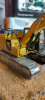 85701 Масштабная модель Cat 320F L гусеничный экскаватор "в работе" в подарочной упаковке с диорамной подставкой в масштабе 1:50