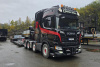 01-5306 Масштабная модель Низкорамный трал Spesialtransport; SCANIA R HIGHLINE CR20H 8X4 в масштабе 1 50